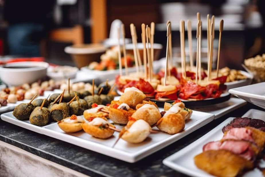 Appetizing spanish tapas with anchovies and shrimp close-up in the restaurant of Seville